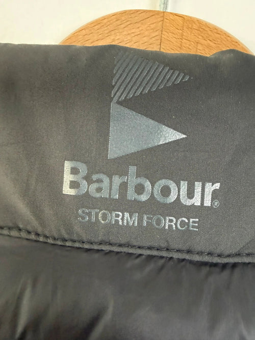 Barbour grey quilted jacket with black front panel and corduroy collar.