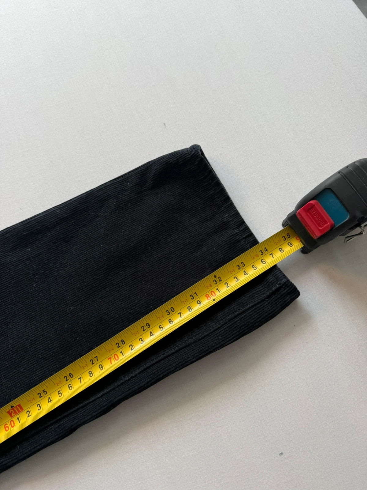 Levi's black straight jeans with classic five-pocket styling and signature back pocket stitching.