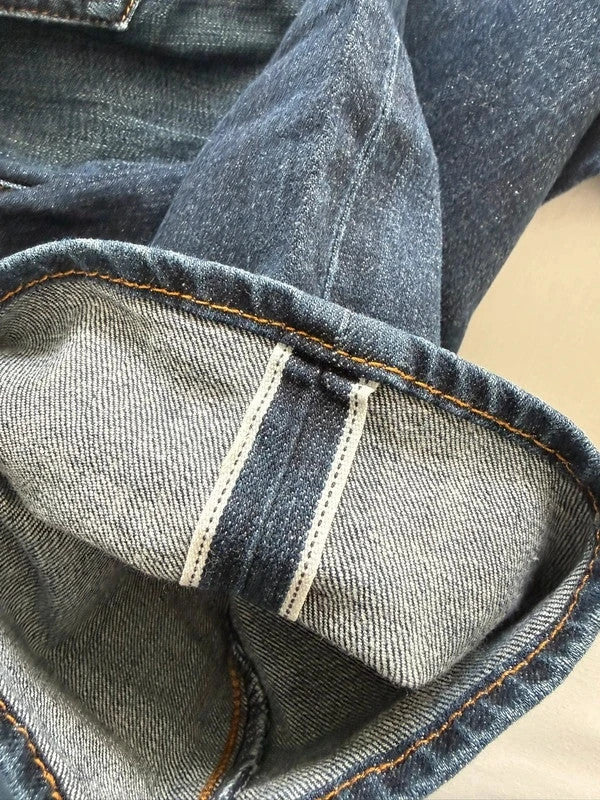 Levi's blue straight jeans with original logo patch and slight stretch material.