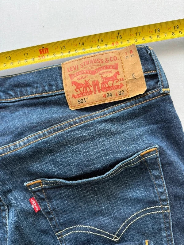 Levi's blue straight jeans with original logo patch and slight stretch material.