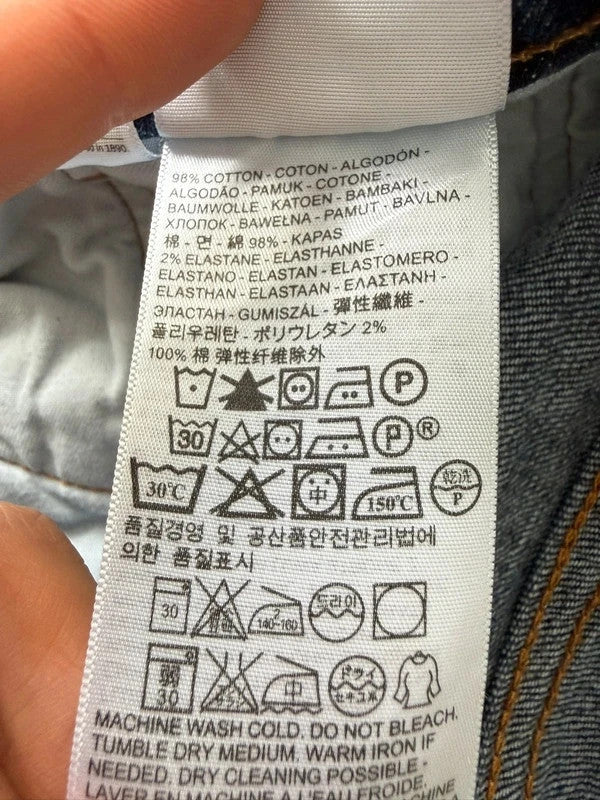 Levi's blue straight jeans with original logo patch and slight stretch material.