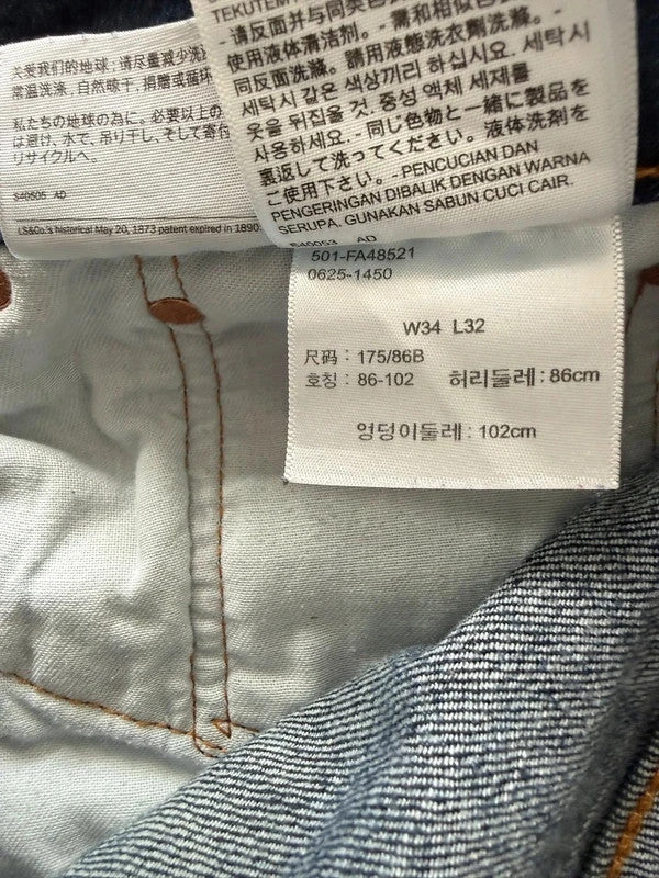 Levi's blue straight jeans with original logo patch and slight stretch material.