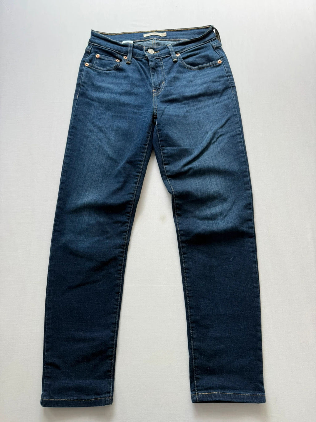Levi's dark blue boyfriend jeans with classic five-pocket styling and leather patch.