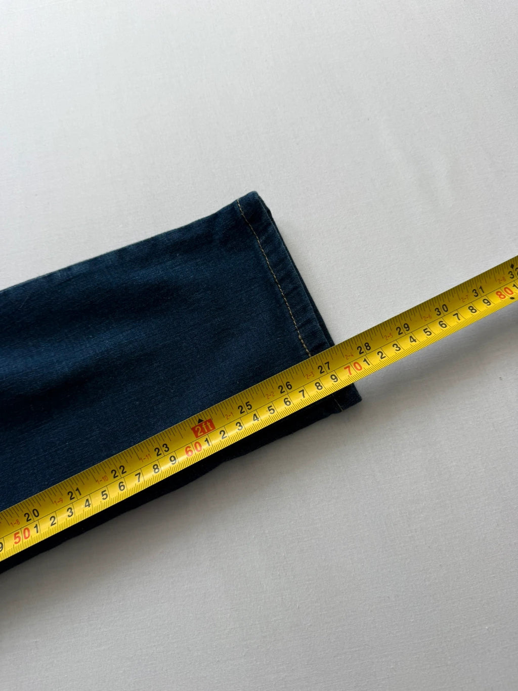 Levi's dark blue boyfriend jeans with classic five-pocket styling and leather patch.