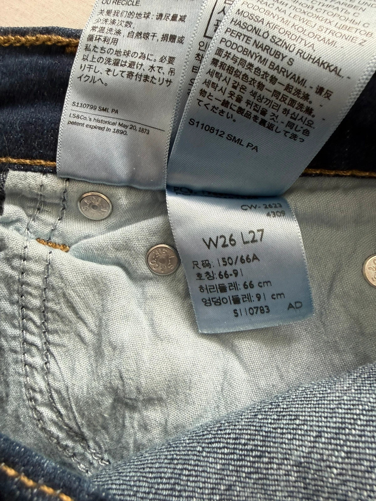 Levi's dark blue boyfriend jeans with classic five-pocket styling and leather patch.