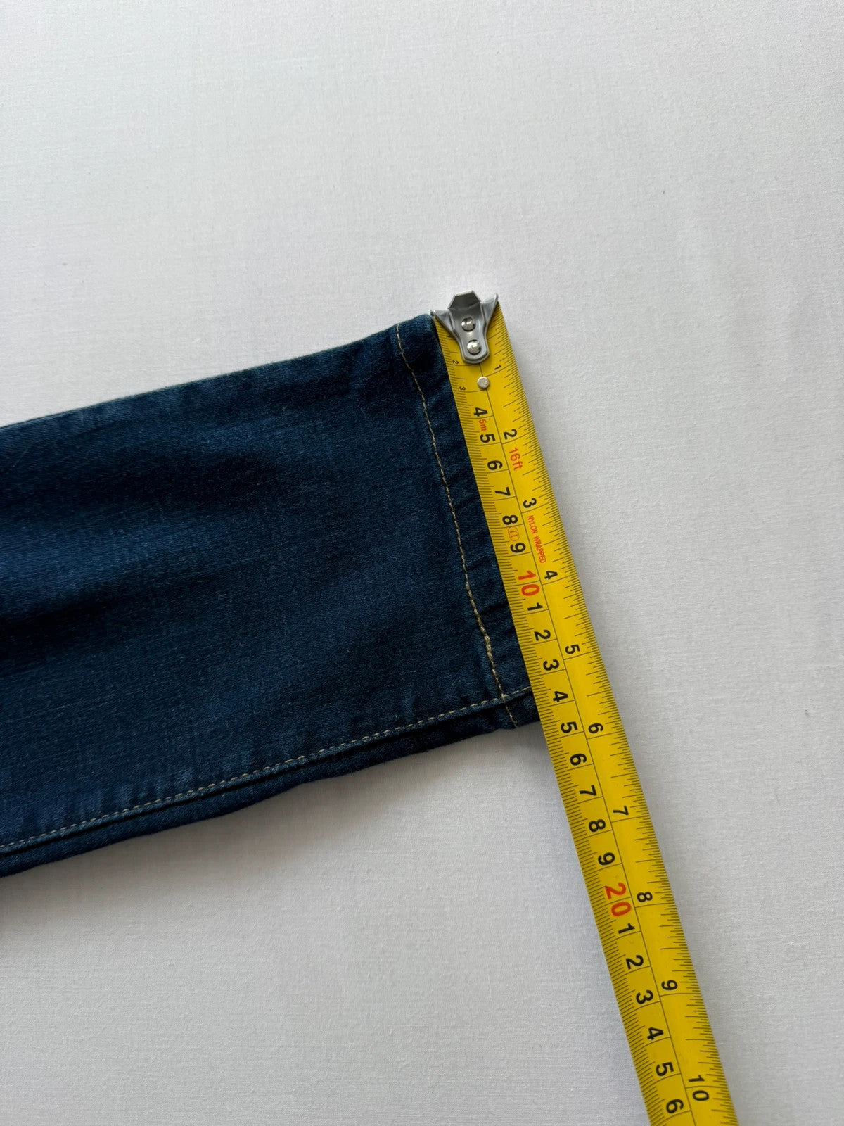 Levi's dark blue boyfriend jeans with classic five-pocket styling and leather patch.