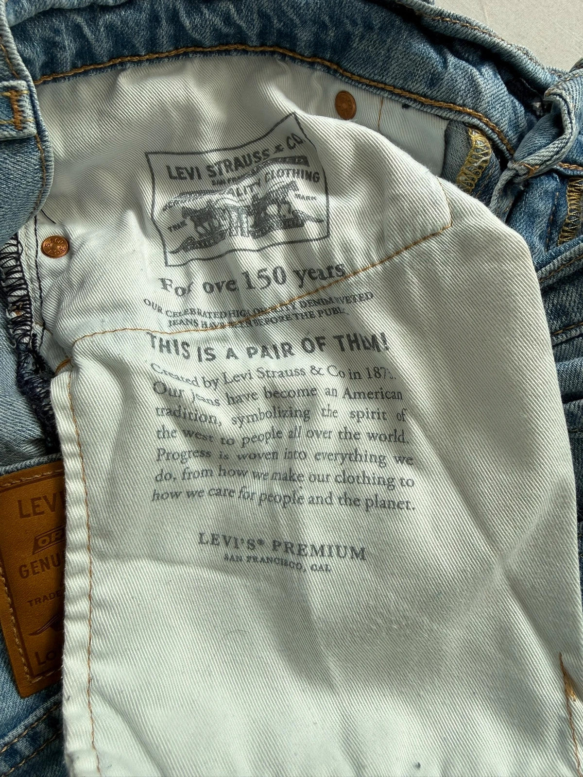 Levi's light blue 511 slim jeans with classic five-pocket styling and leather patch.