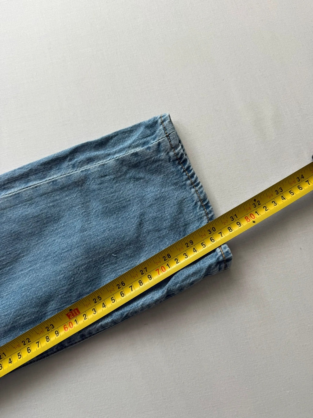 Levi's light blue 511 slim jeans with classic five-pocket styling and leather patch.