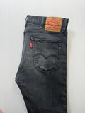 Levi's grey tapered jeans with classic 5-pocket styling and signature back stitching.