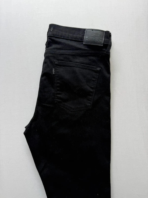 Levi's black super skinny jeans with premium stretch fabric and mid-rise fit.