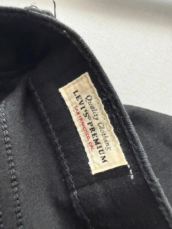 Levi's black super skinny jeans with premium stretch fabric and mid-rise fit.