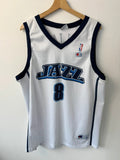 Champion graphic tee blue and white, embroidered NBA logo, mesh fabric, sleeveless cut.