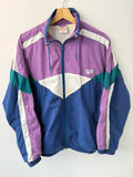 HI-TEC 90s colourblock shell jacket purple with teal and navy chevron panels.