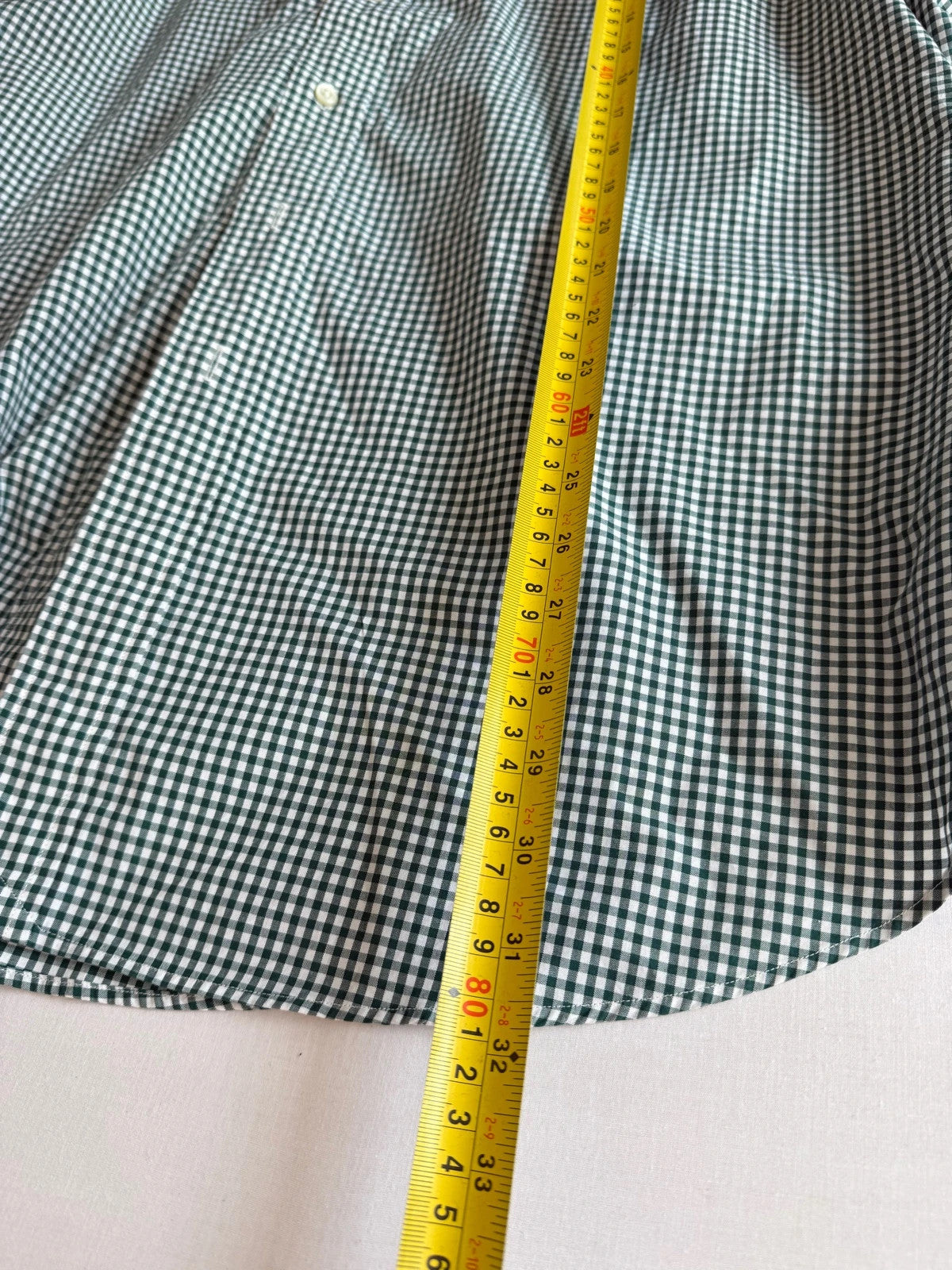 Ralph Lauren green and white gingham shirt with embroidered pony logo and button-down collar.