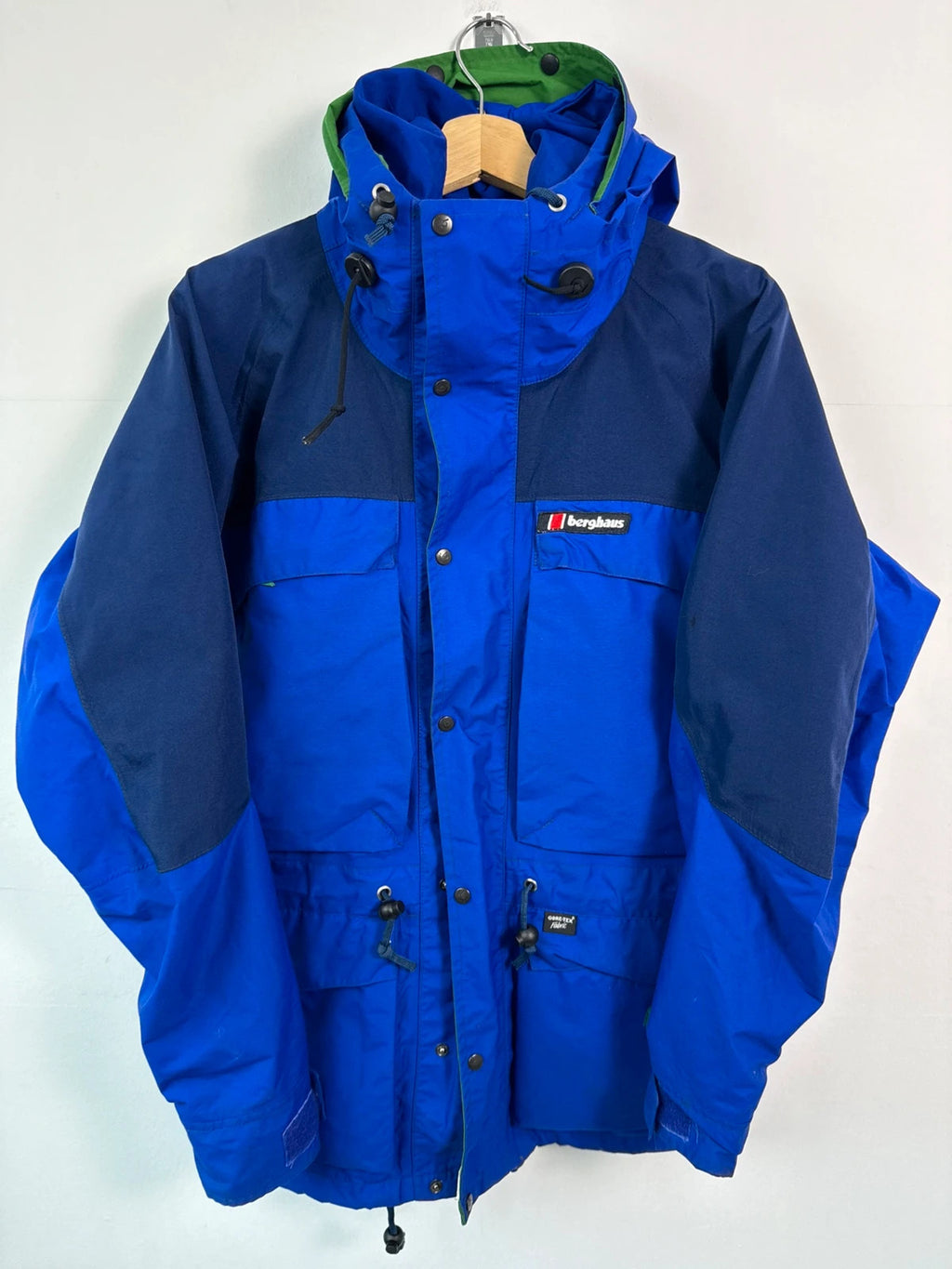 Berghaus blue green 90s Mera Peak jacket with colour-block design and Gore-Tex fabric.