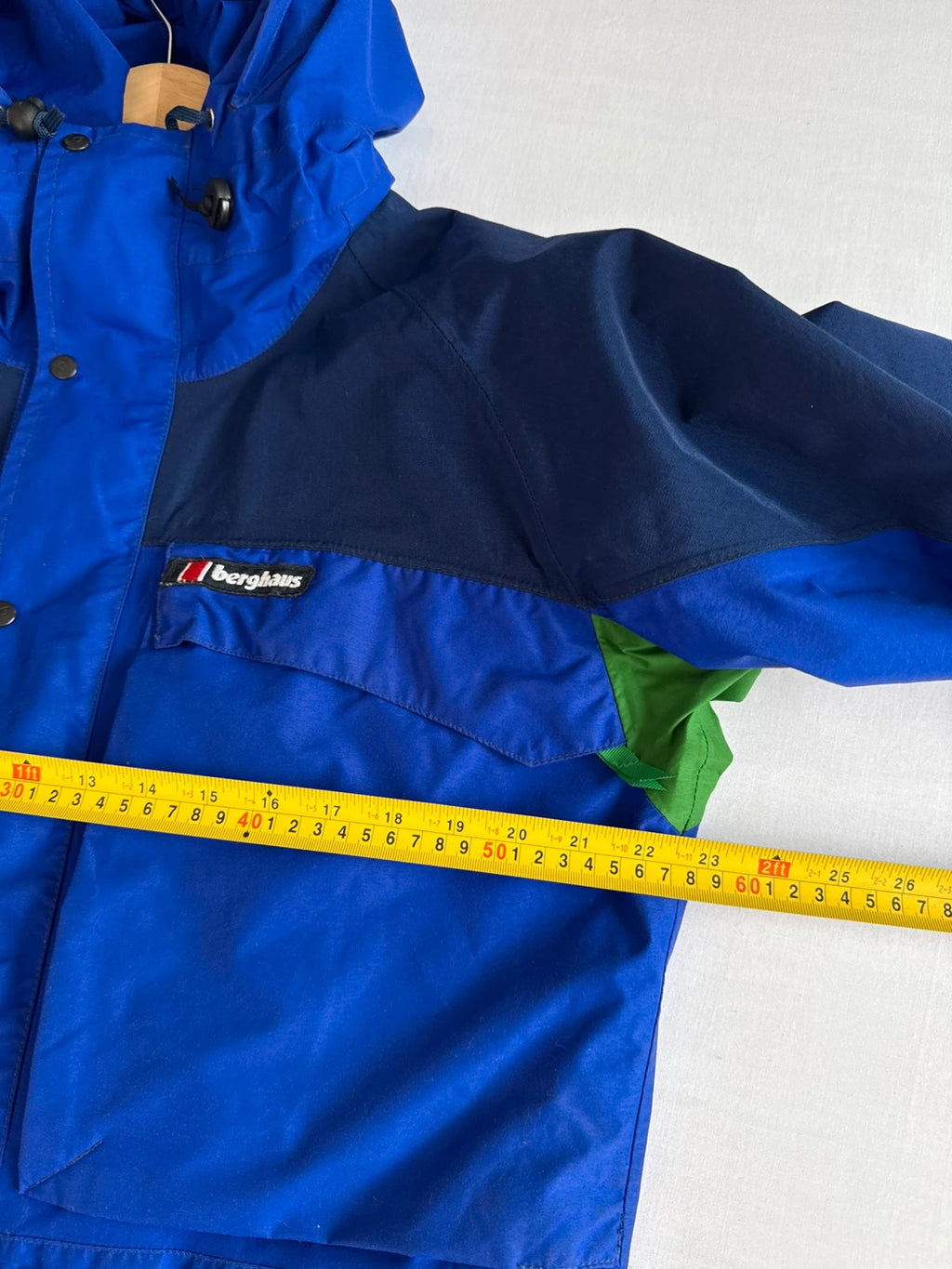Berghaus blue green 90s Mera Peak jacket with colour-block design and Gore-Tex fabric.