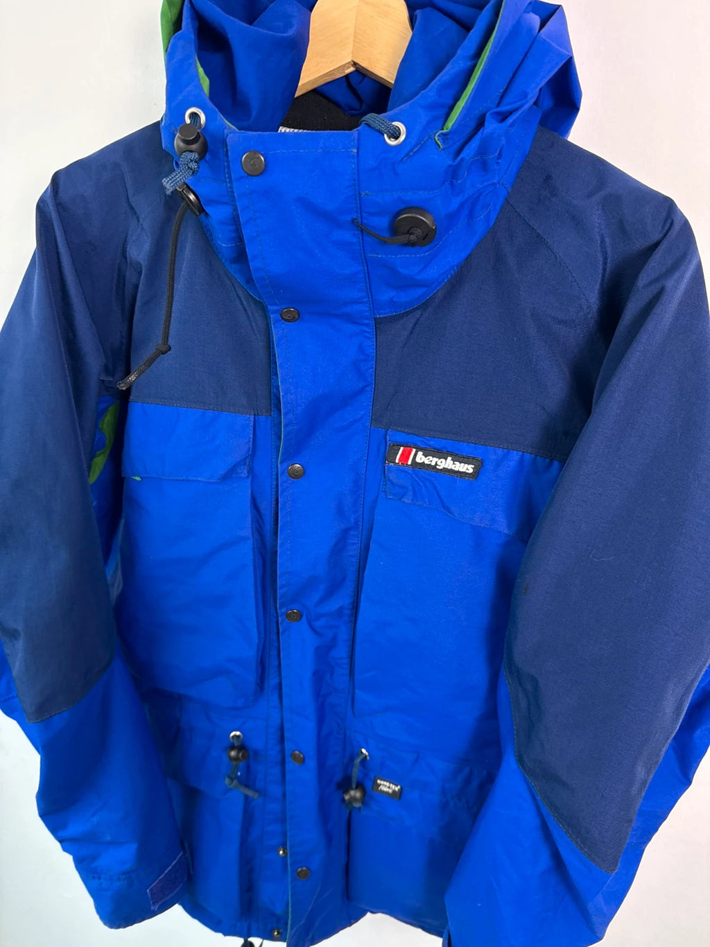 Berghaus blue green 90s Mera Peak jacket with colour-block design and Gore-Tex fabric.