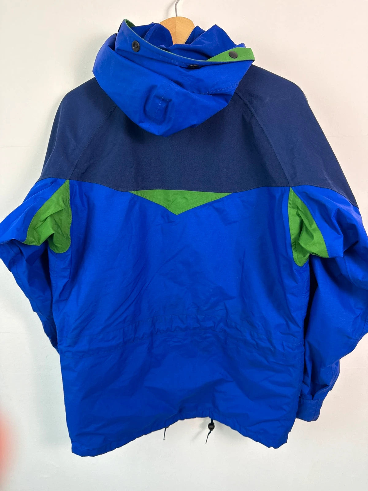 Berghaus blue green 90s Mera Peak jacket with colour-block design and Gore-Tex fabric.