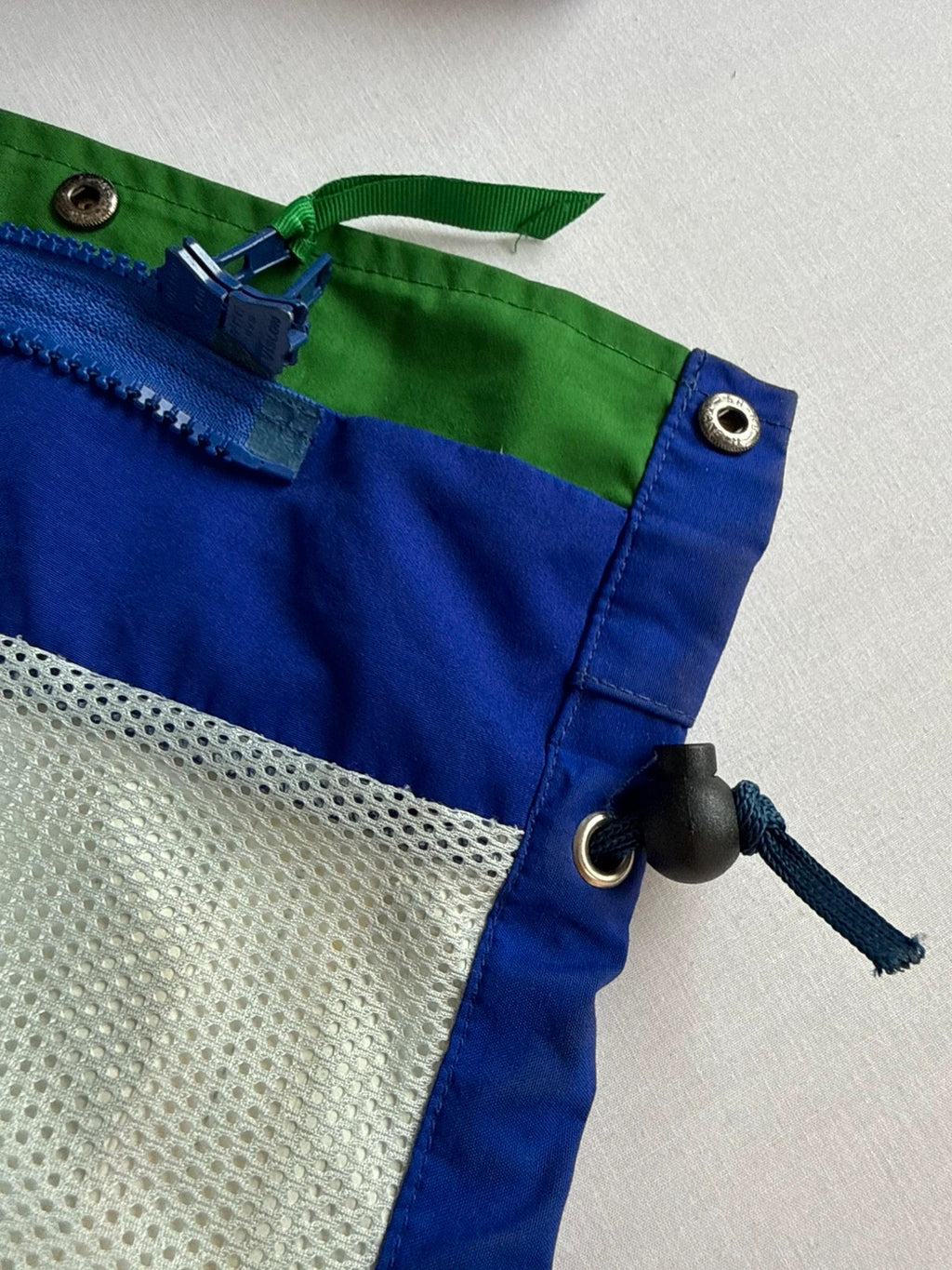 Berghaus blue green 90s Mera Peak jacket with colour-block design and Gore-Tex fabric.