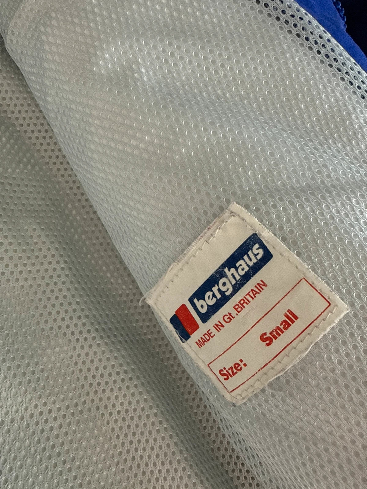 Berghaus blue green 90s Mera Peak jacket with colour-block design and Gore-Tex fabric.