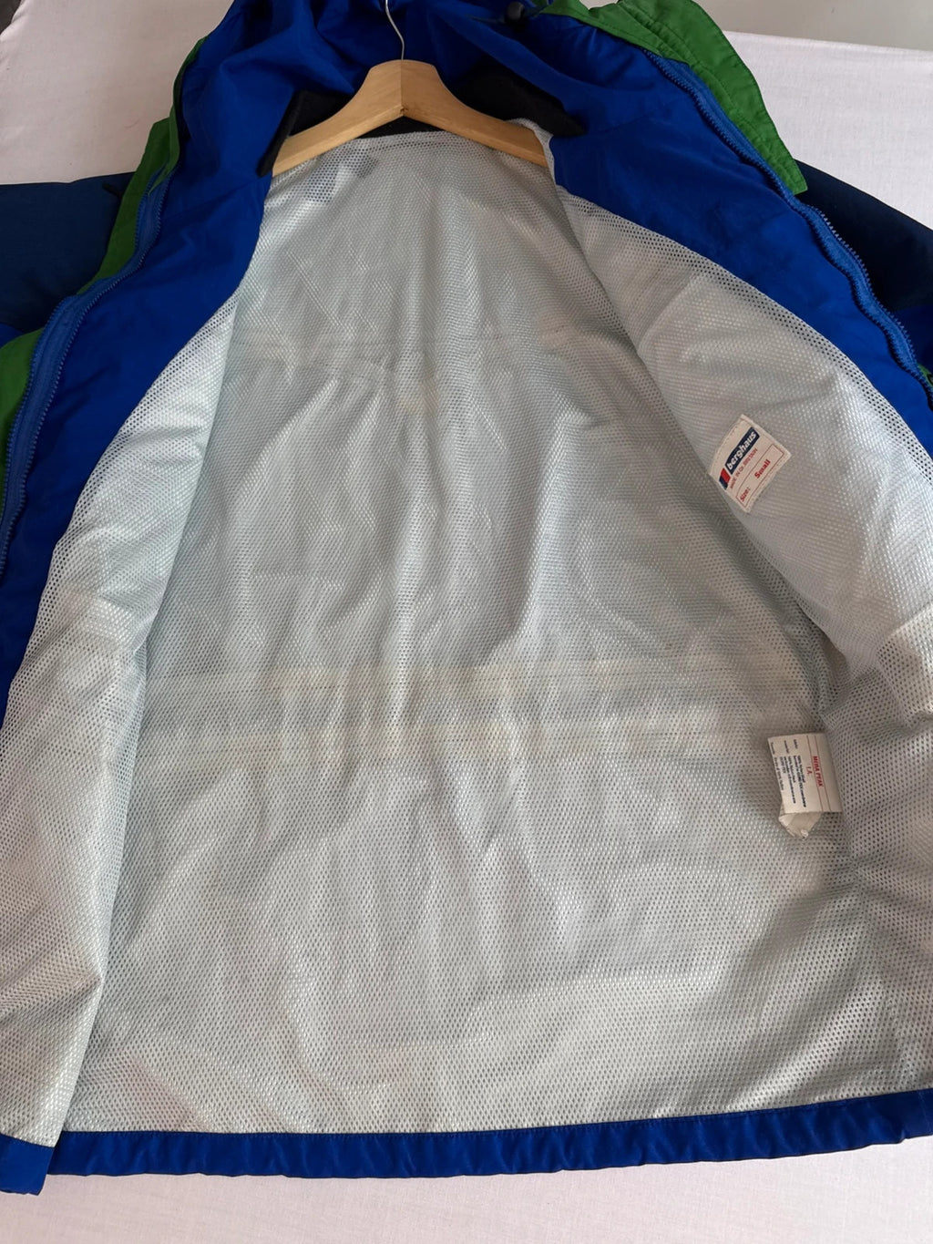 Berghaus blue green 90s Mera Peak jacket with colour-block design and Gore-Tex fabric.
