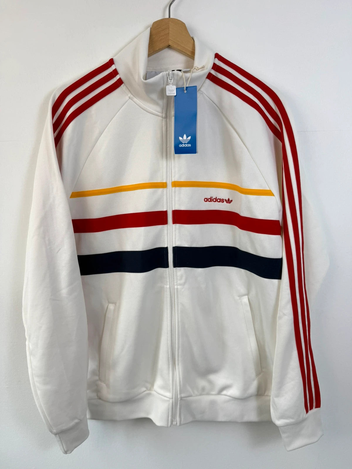 Adidas white track top with red 3-stripes, tonal stripes, full zip, stand-up collar.