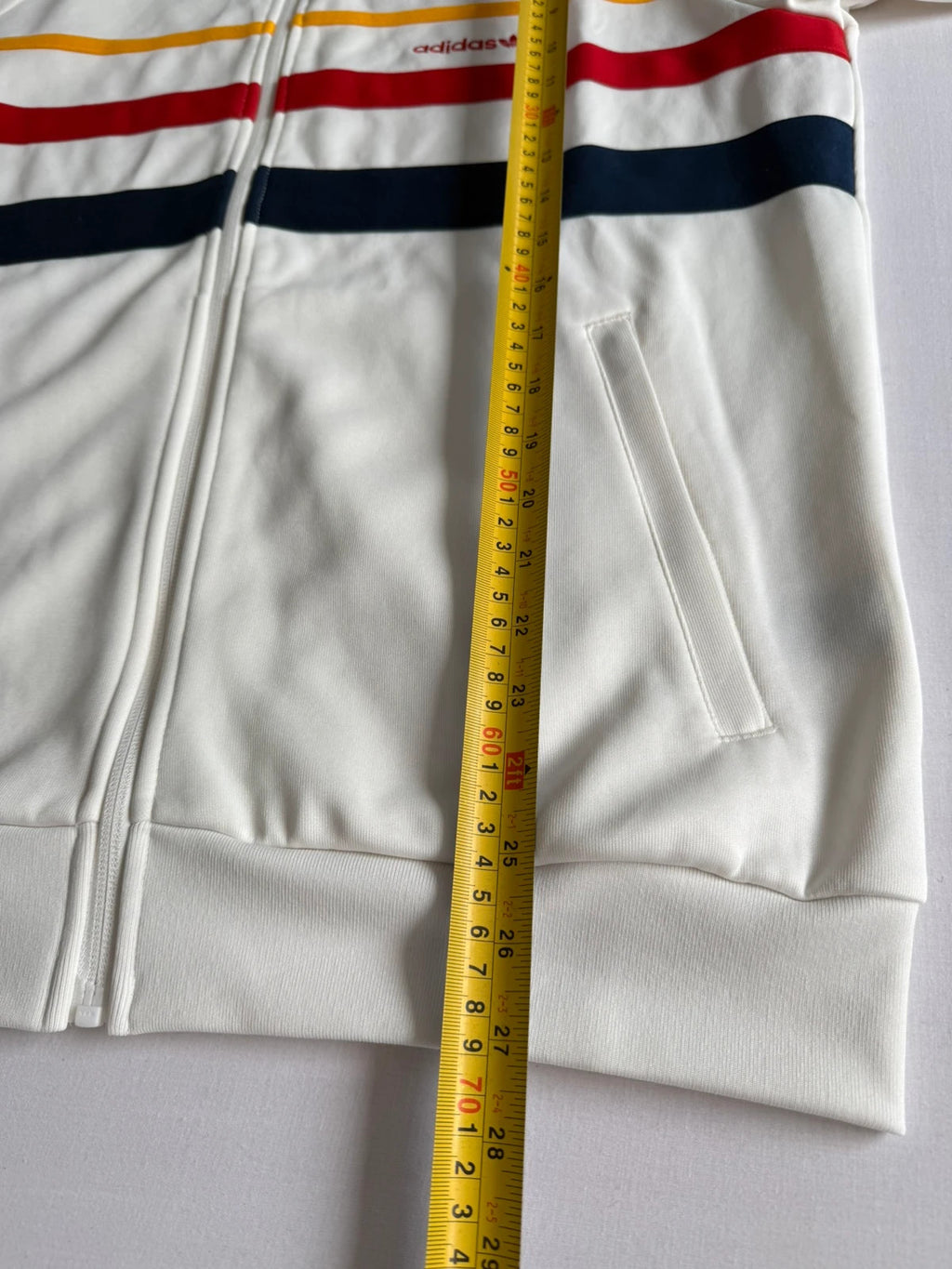 Adidas white track top with red 3-stripes, tonal stripes, full zip, stand-up collar.