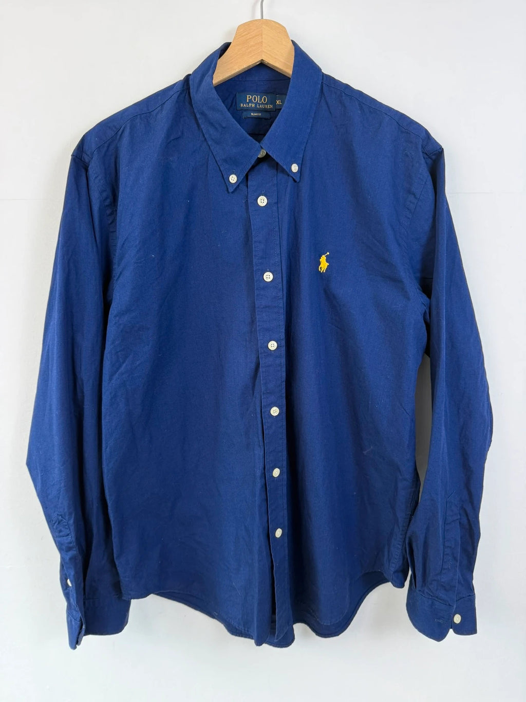 Ralph Lauren navy slim fit Oxford shirt with embroidered pony logo and button-down collar.