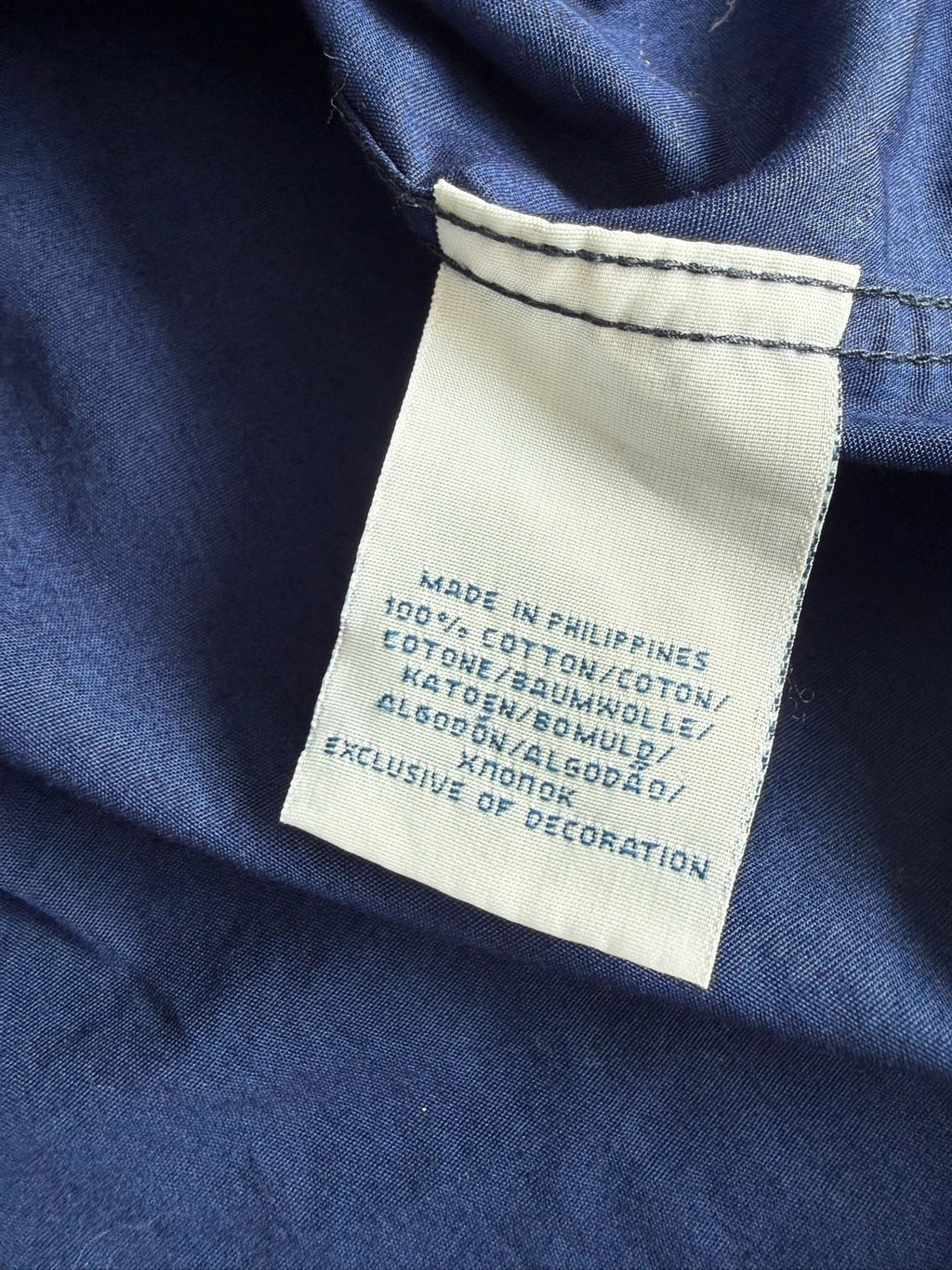 Ralph Lauren navy slim fit Oxford shirt with embroidered pony logo and button-down collar.