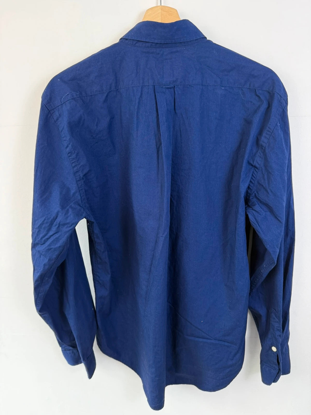 Ralph Lauren navy slim fit Oxford shirt with embroidered pony logo and button-down collar.