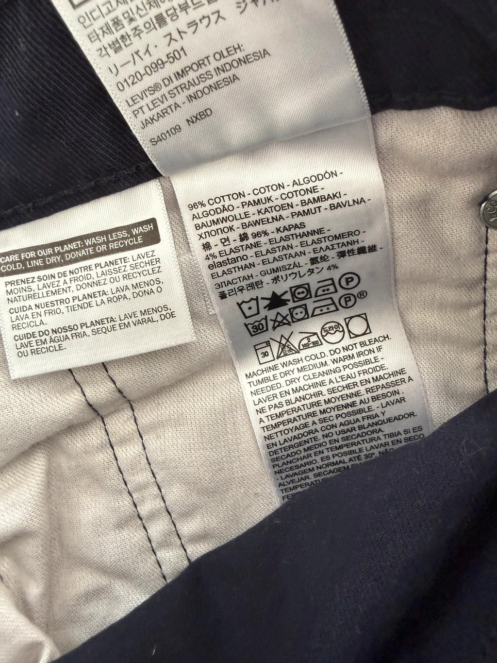 Levi's navy straight jeans with red tab logo and stretch cotton denim.