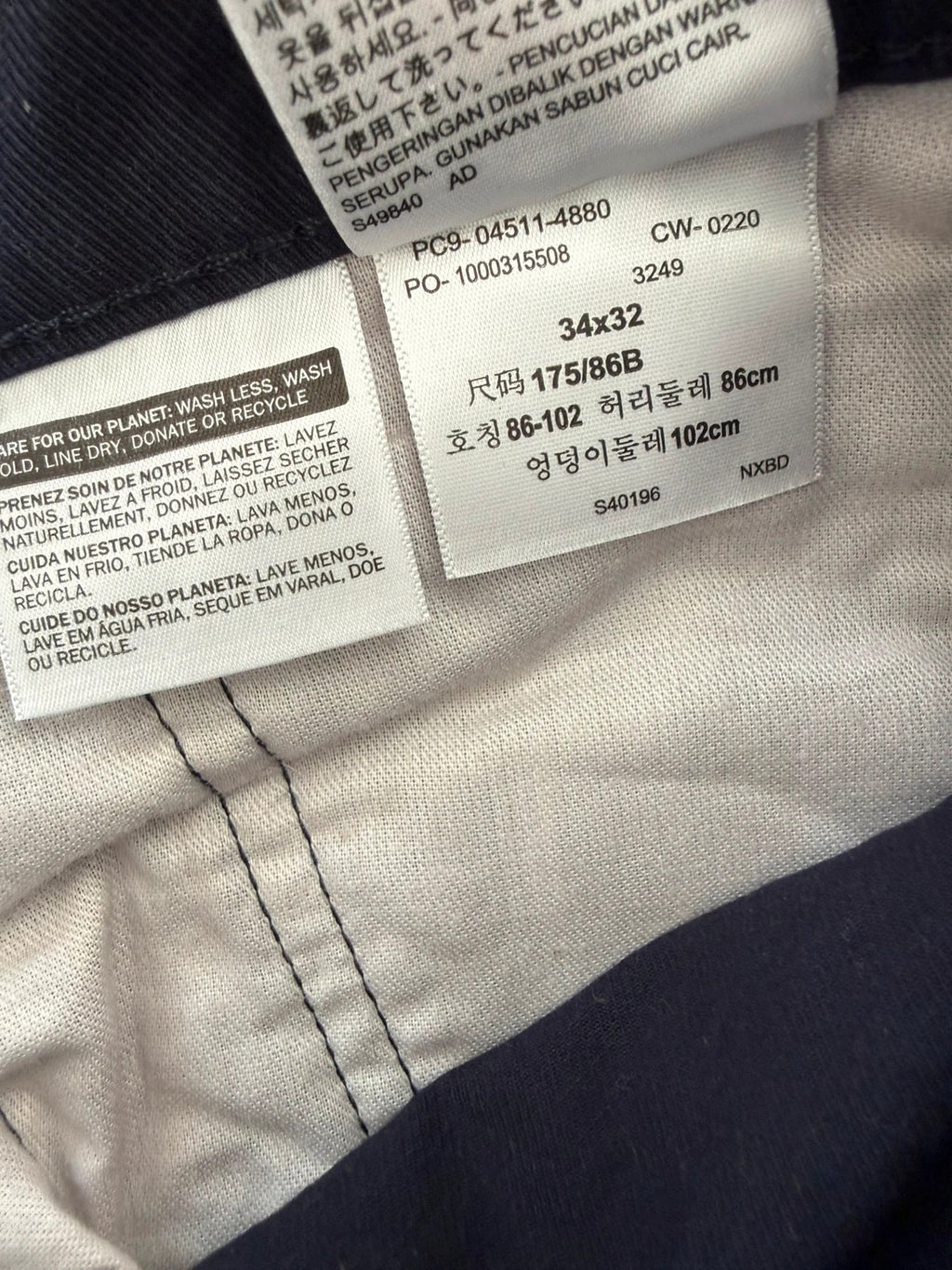 Levi's navy straight jeans with red tab logo and stretch cotton denim.