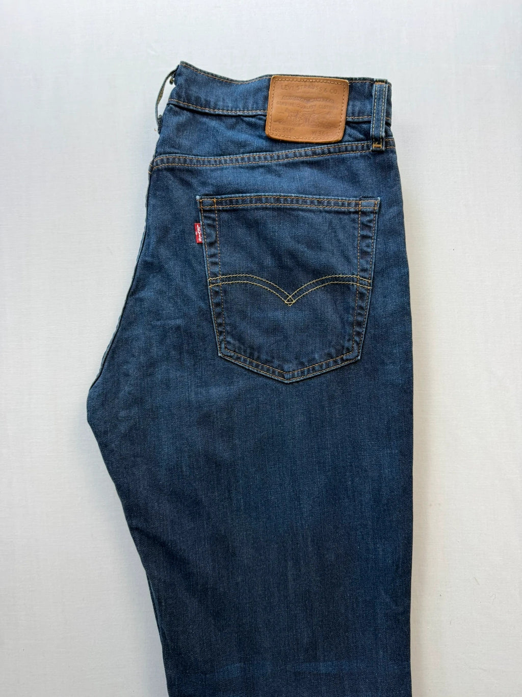 Levi's straight jeans navy blue stretch denim with premium label and altered length.