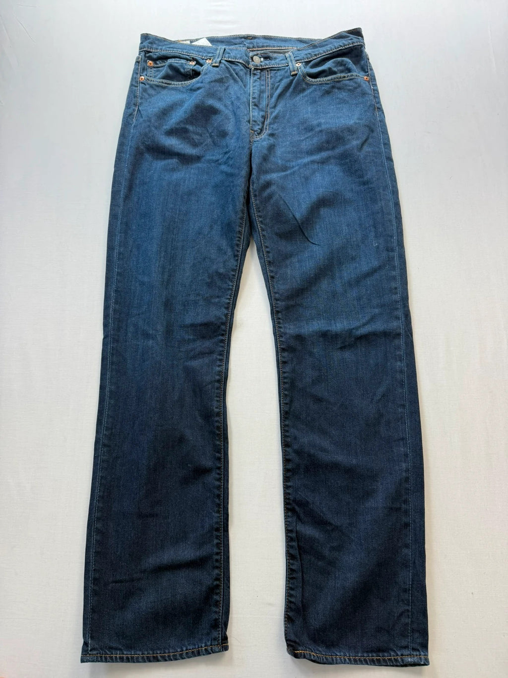 Levi's straight jeans navy blue stretch denim with premium label and altered length.