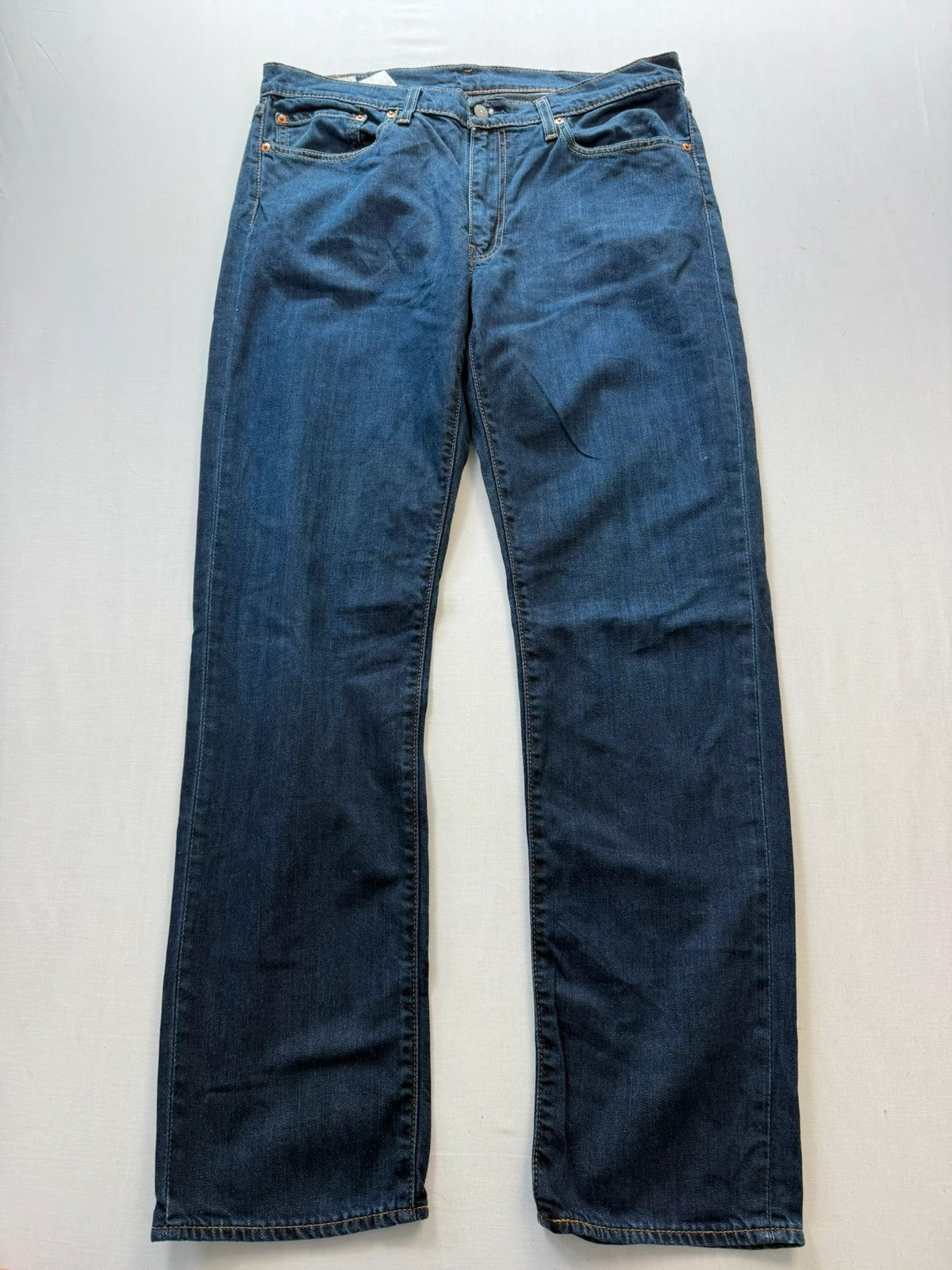 Levi's straight jeans navy blue stretch denim with premium label and altered length.