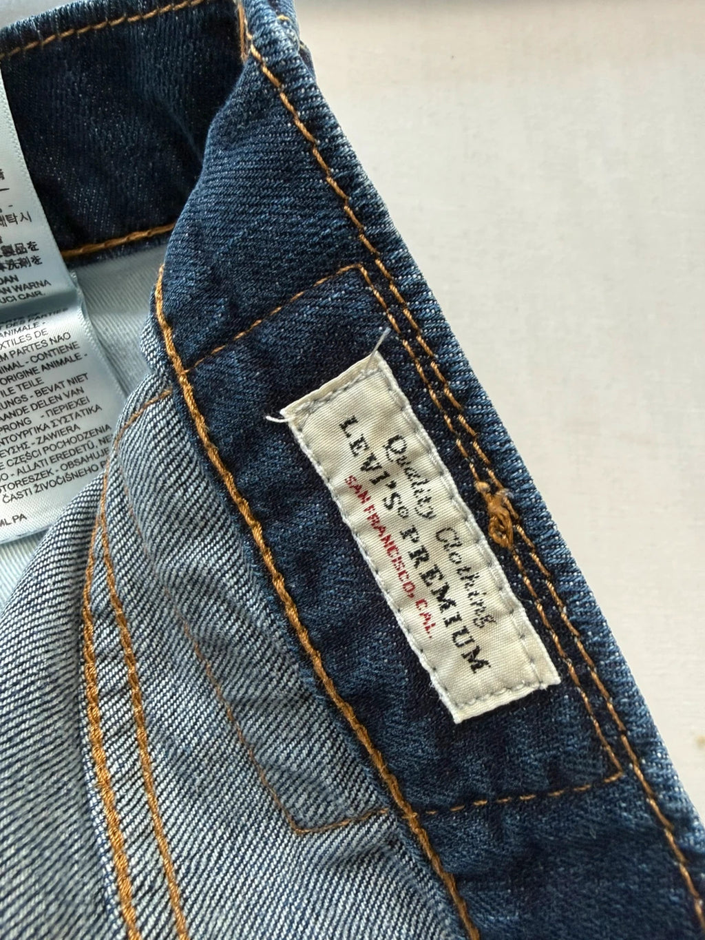 Levi's straight jeans navy blue stretch denim with premium label and altered length.
