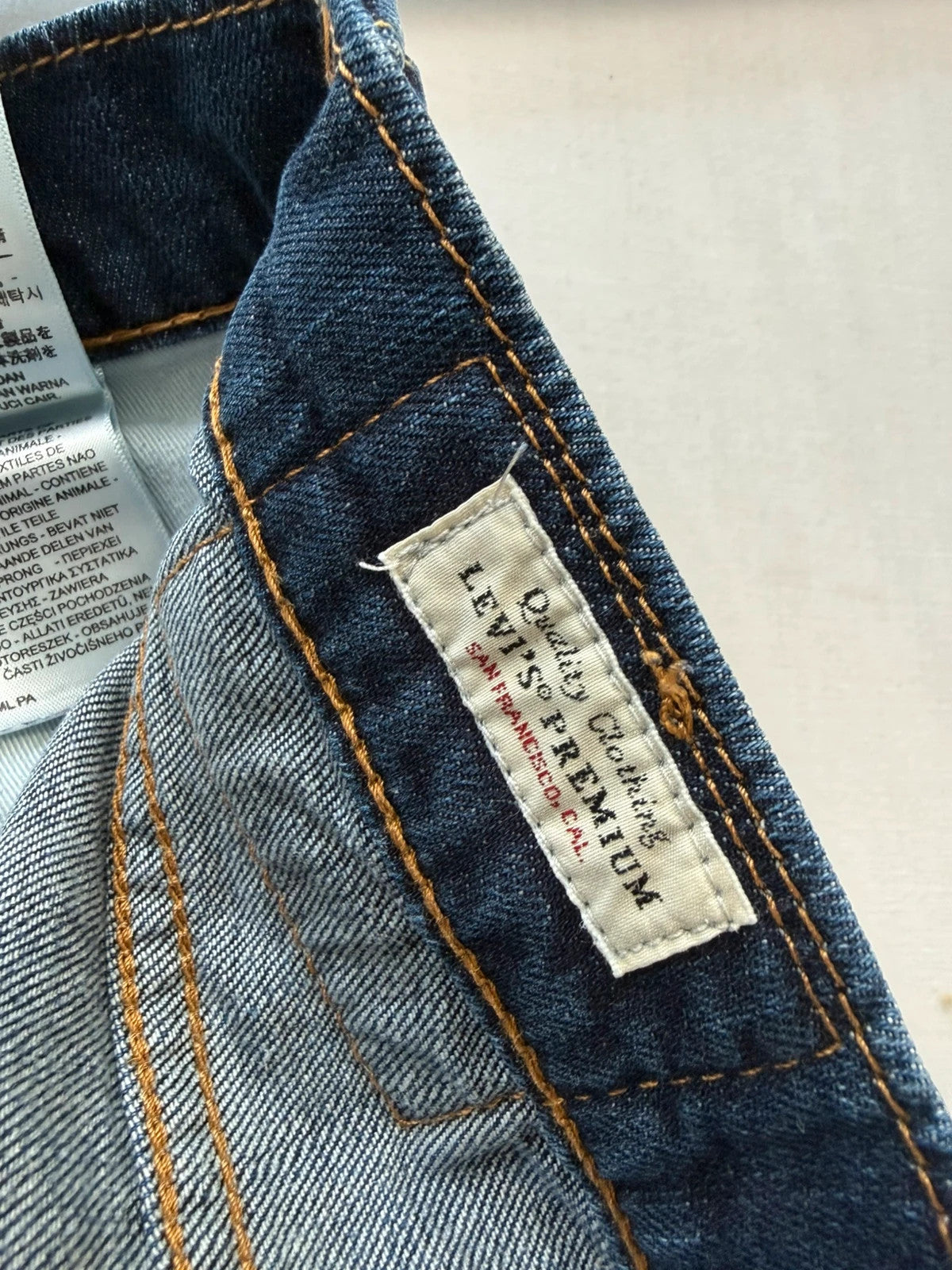 Levi's straight jeans navy blue stretch denim with premium label and altered length.