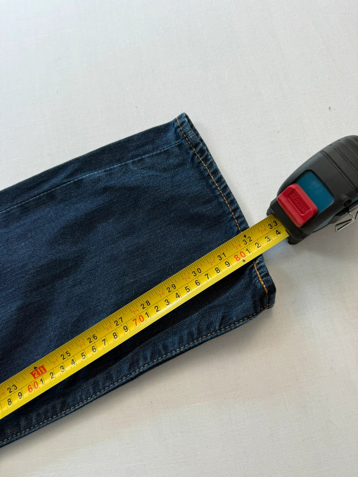 Levi's straight jeans navy blue stretch denim with premium label and altered length.