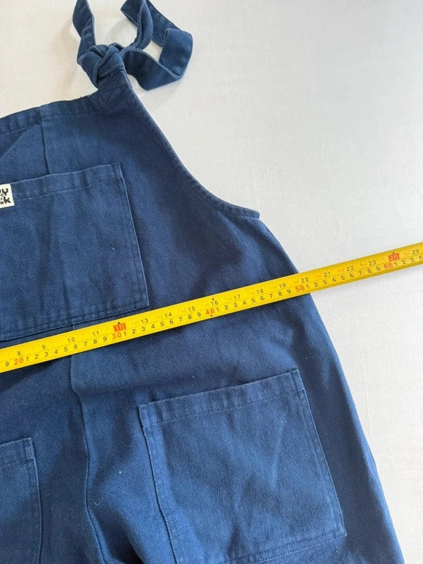 Lucy & Yak navy dungarees with adjustable straps, front bib pocket, and relaxed fit.
