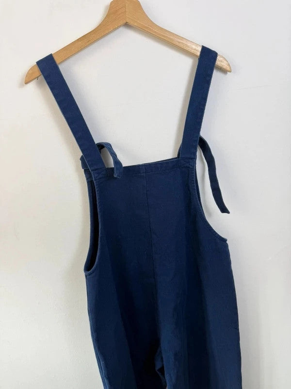 Lucy & Yak navy dungarees with adjustable straps, front bib pocket, and relaxed fit.