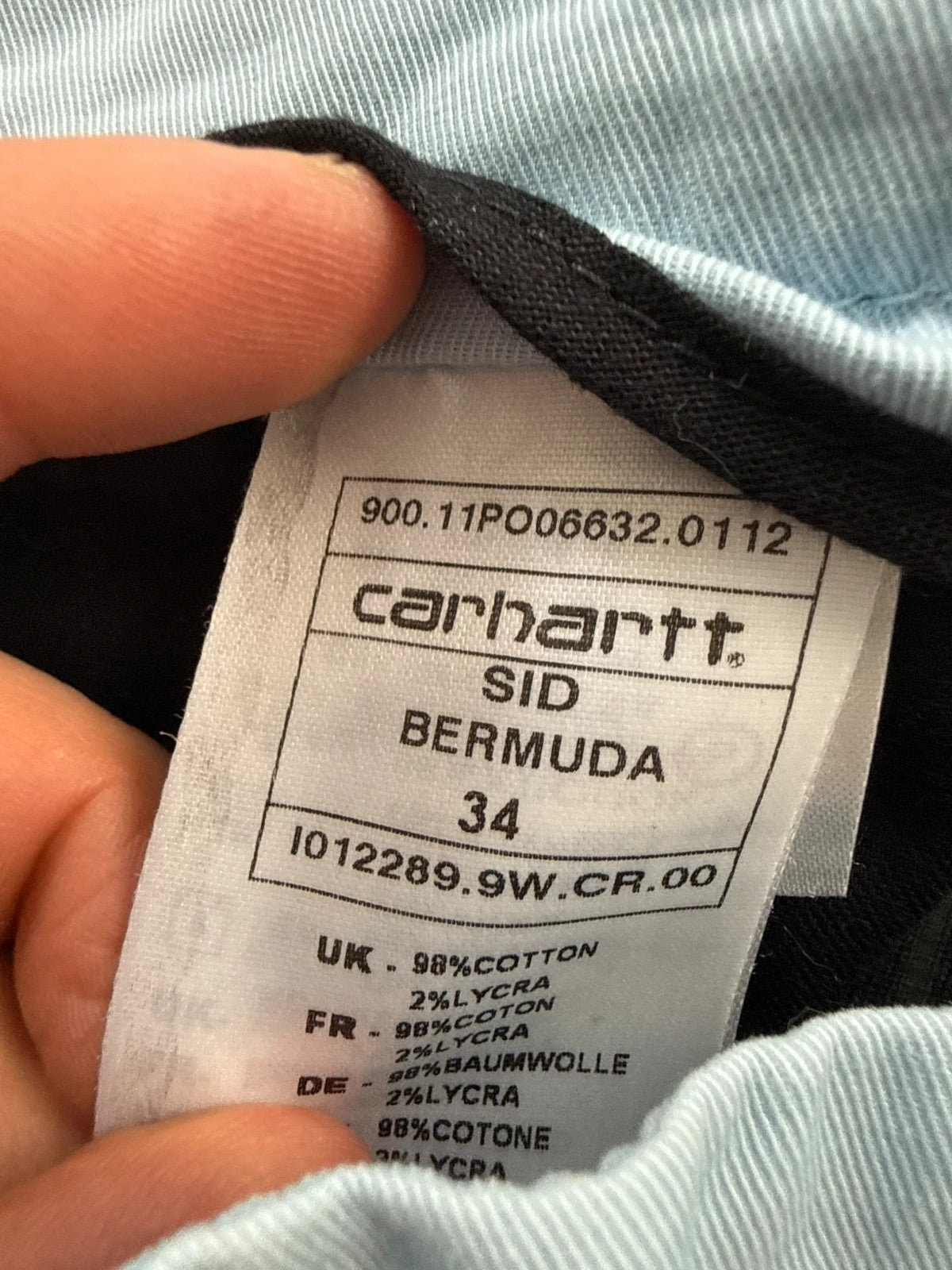 Carhartt light blue chino shorts with back pocket branded patch and soft stretch cotton twill.