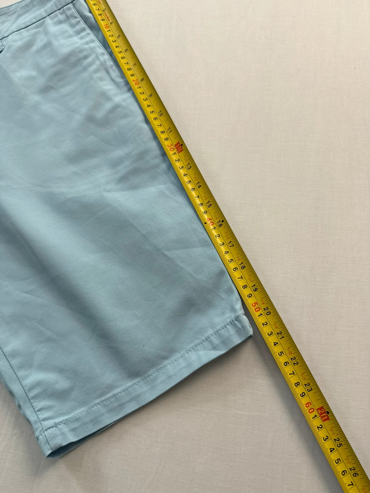 Carhartt light blue chino shorts with back pocket branded patch and soft stretch cotton twill.