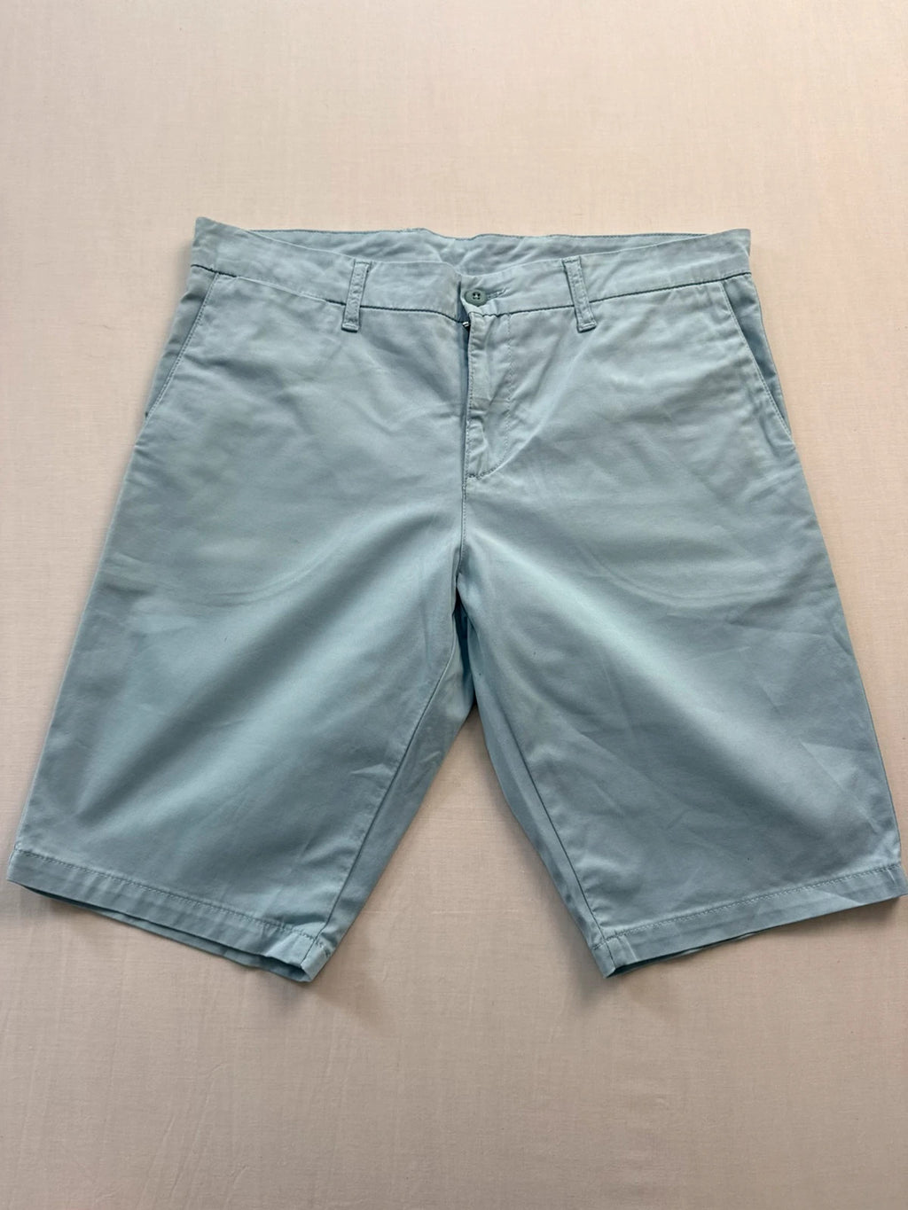 Carhartt light blue chino shorts with back pocket branded patch and soft stretch cotton twill.