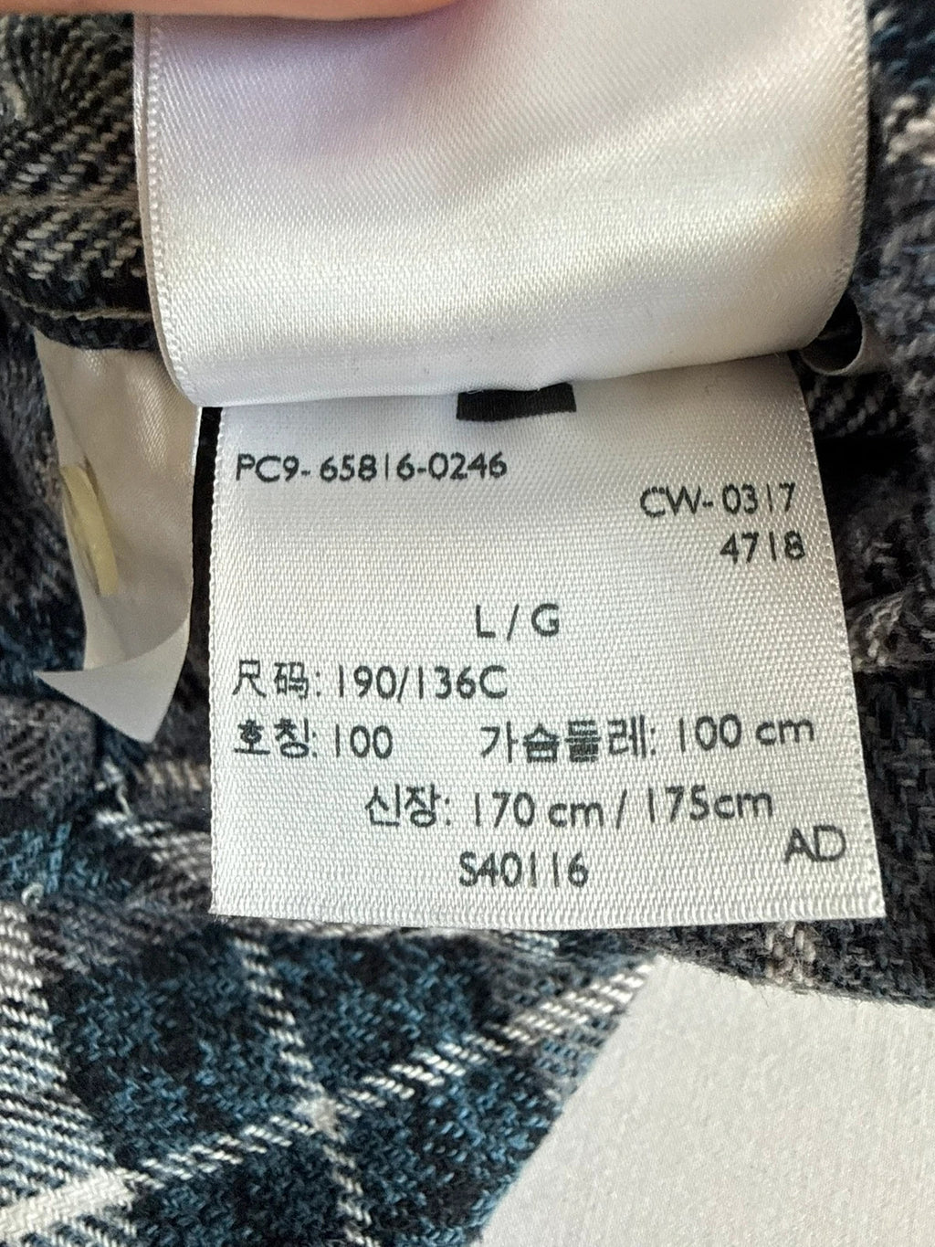 Levi's blue and grey plaid flannel shirt, thick cotton, chest button-flap pockets.