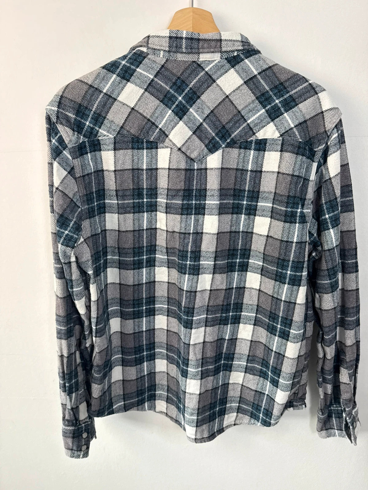 Levi's blue and grey plaid flannel shirt, thick cotton, chest button-flap pockets.