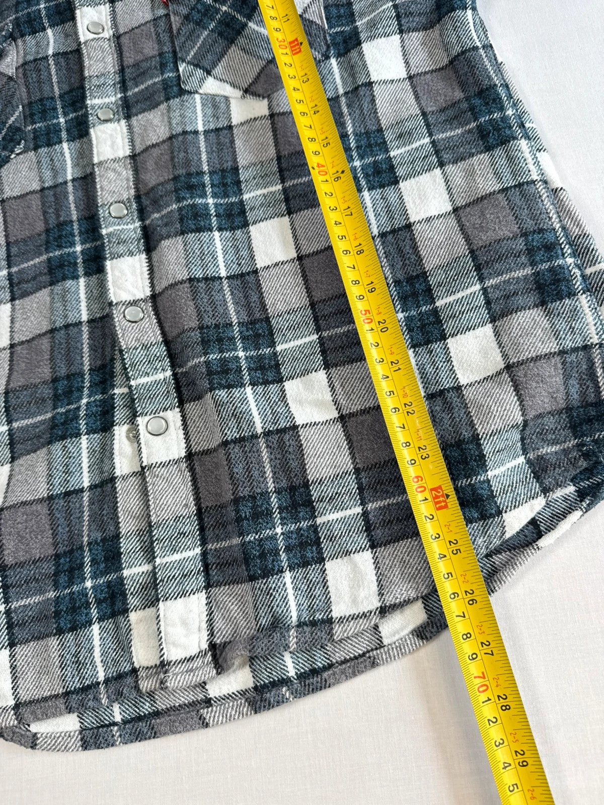 Levi's blue and grey plaid flannel shirt, thick cotton, chest button-flap pockets.