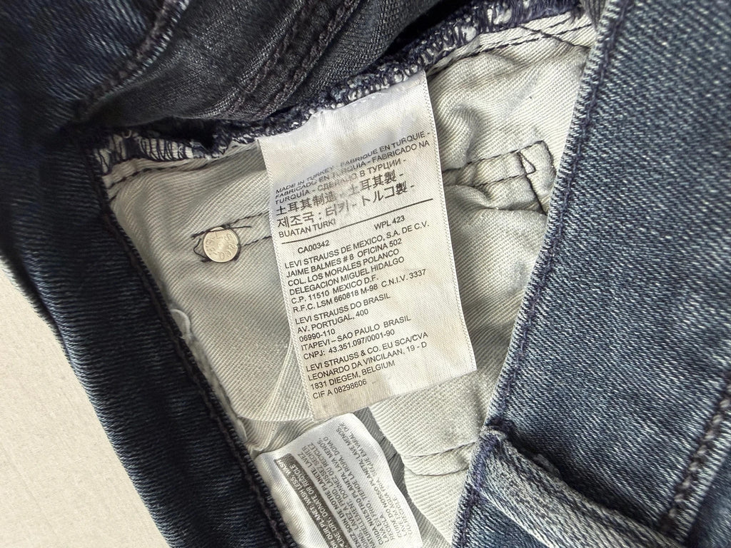 Levi's straight jeans dark indigo black wash with signature back arcuate stitching.