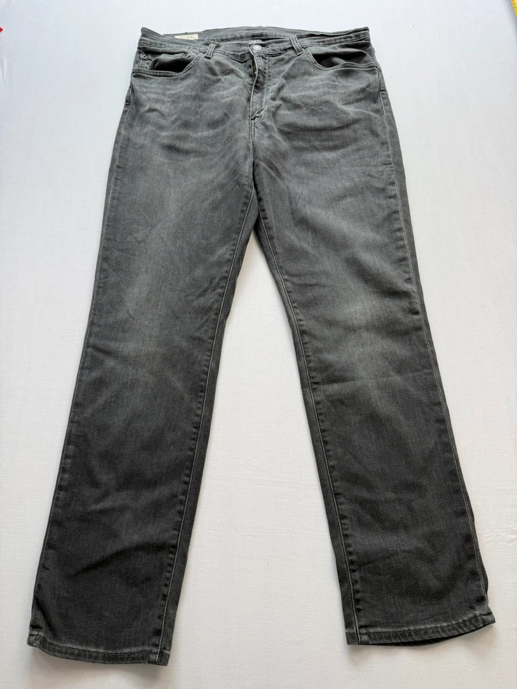 Levi's grey black slim fit jeans with classic five-pocket styling and back arcuate stitching.