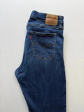 Levi's mid blue straight jeans with classic five-pocket styling and comfortable stretch fit.
