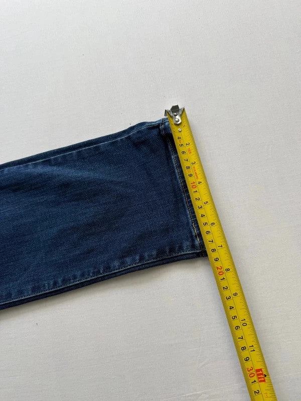Levi's mid blue straight jeans with classic five-pocket styling and comfortable stretch fit.